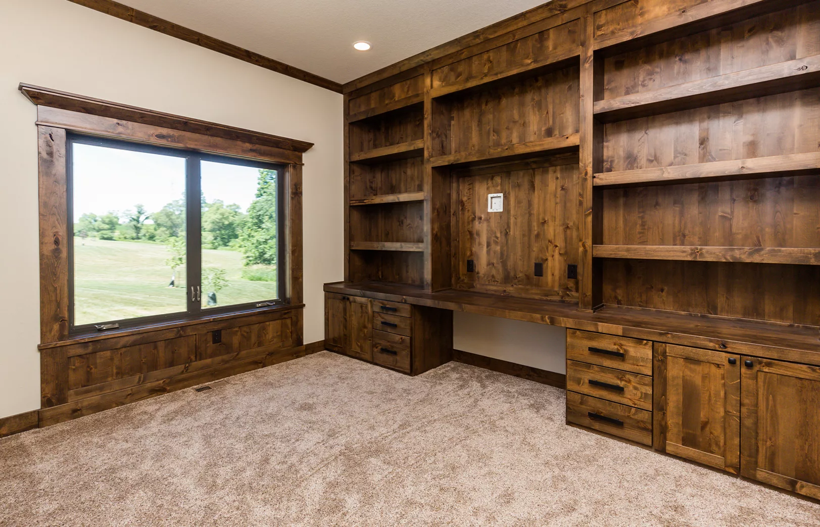 rustic wood built-in desk and shelves
